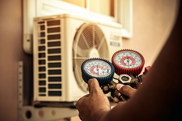 Professional Heat Pump Repair technician working in Kent City, MI